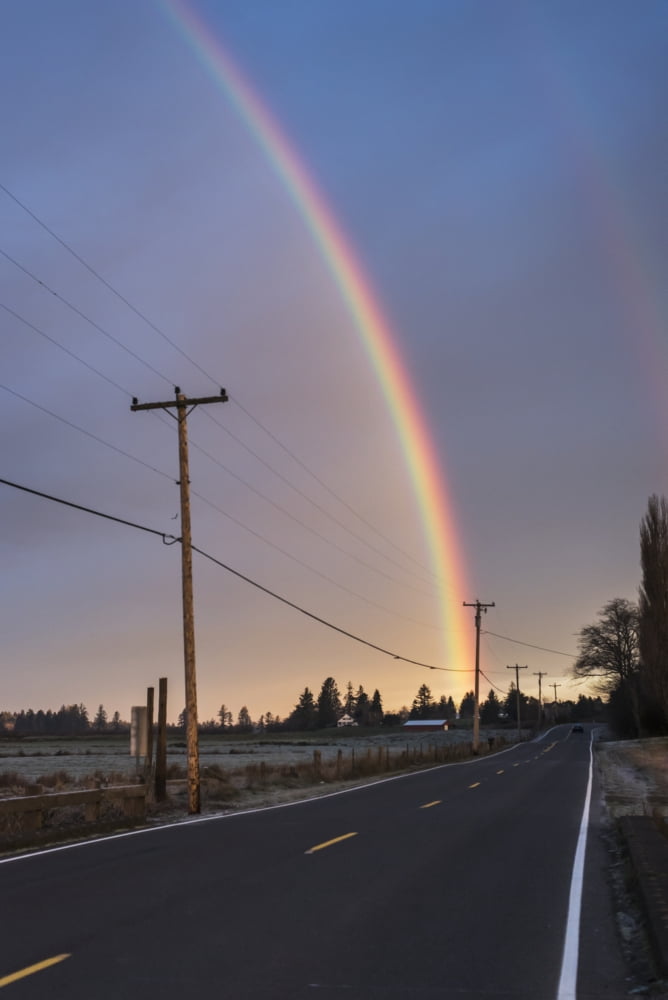 Posterazzi A rainbow brightens a sky Astoria Oregon United States of America Canvas Art - Robert L Potts Design Pics (24 x 38)