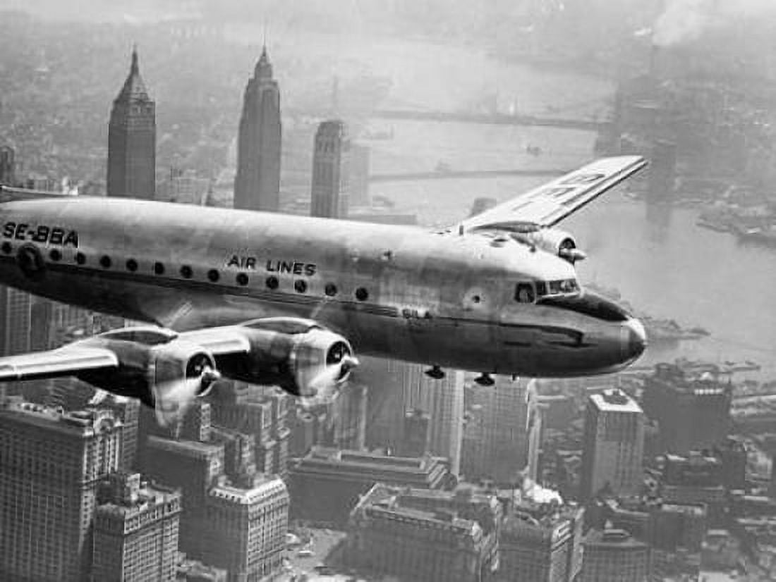 Posterazzi Aircraft Flying over City 1946 Canvas Art - Anonymous (22 x 28)