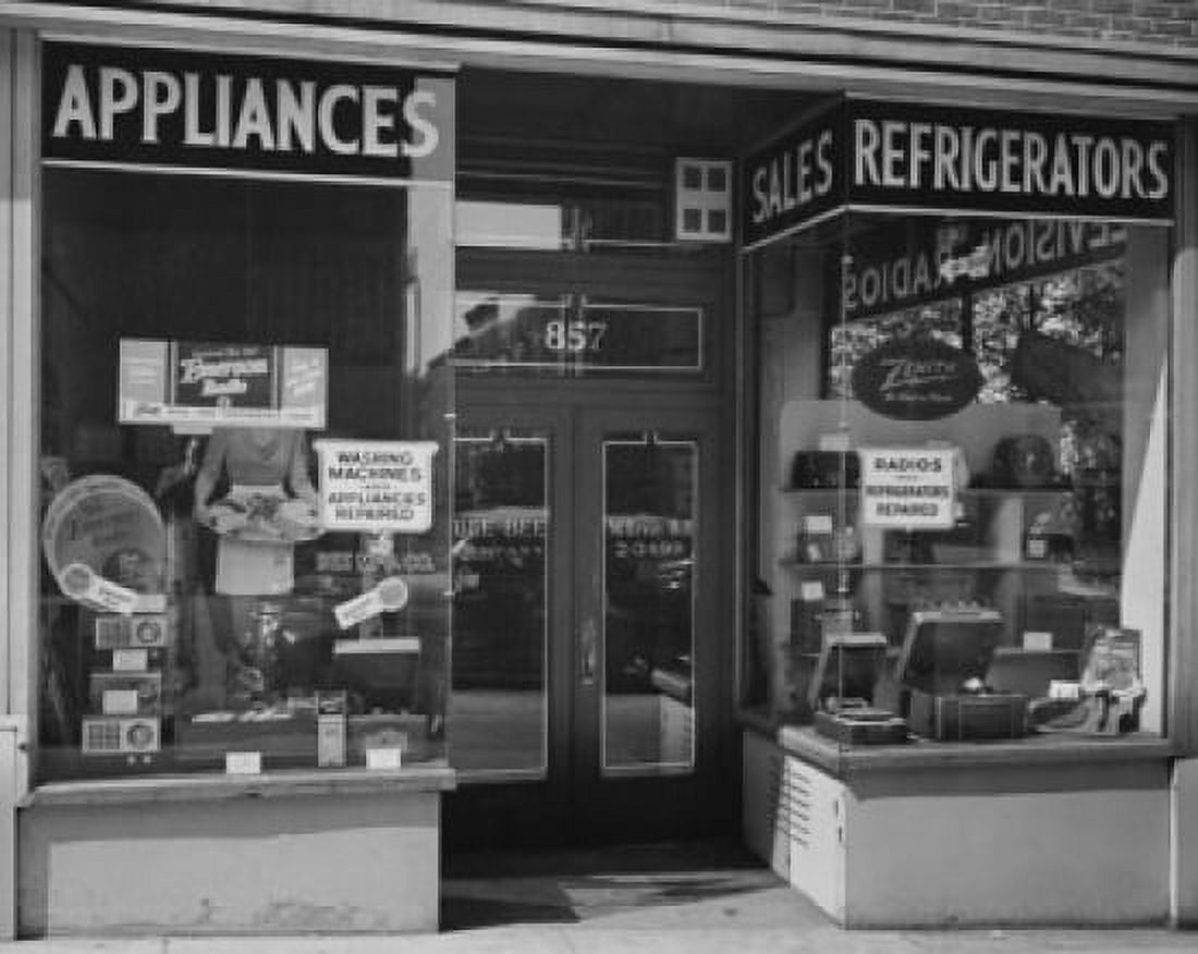 Posterazzi Appliances in a window display of an electronics store Canvas Art - (24 x 36)