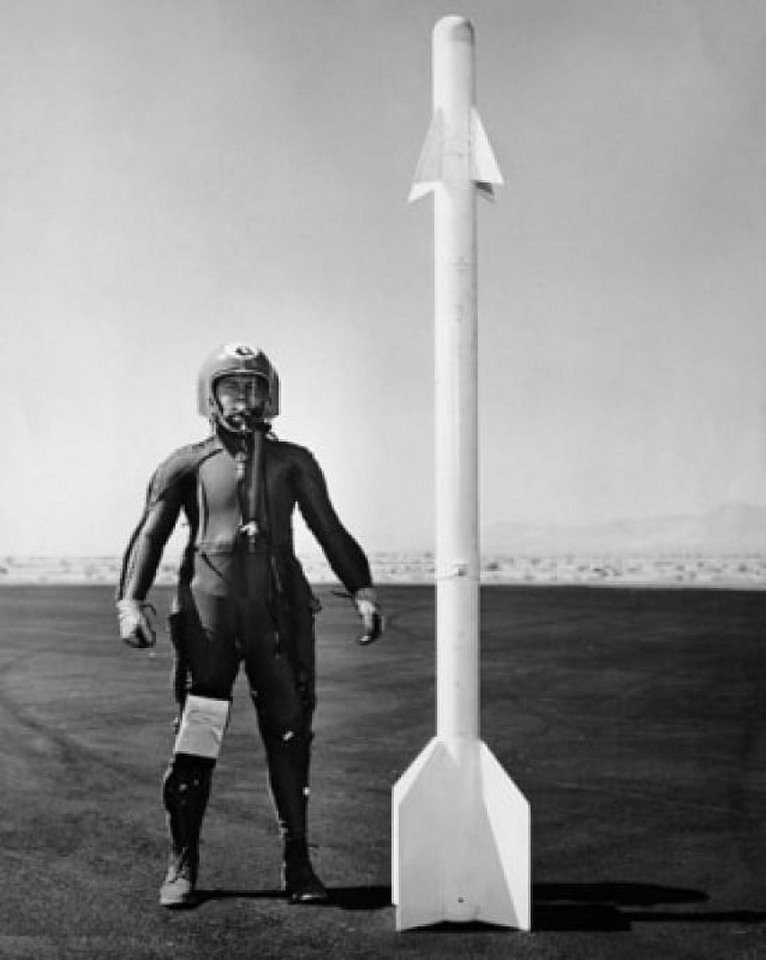 Posterazzi Army soldier standing near a missile Canvas Art - (24 x 36)