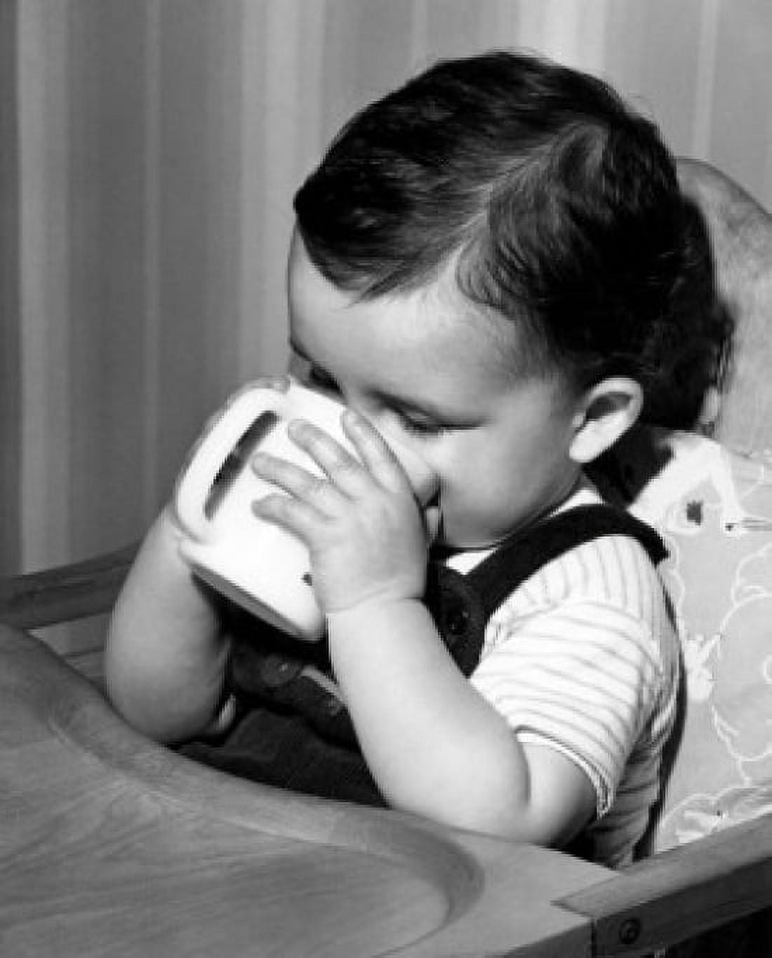 Posterazzi Baby sitting in high chair drinking from mug Canvas Art - (24 x 36)