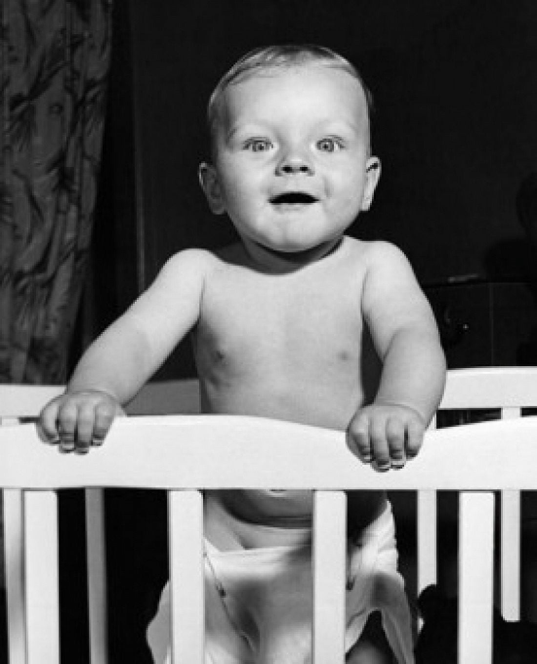 Posterazzi Baby standing in a crib Canvas Art - (24 x 36)