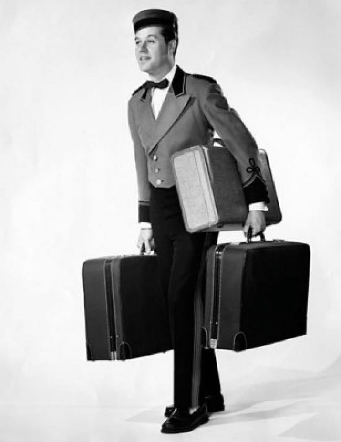 Posterazzi Bellhop carrying luggage Canvas Art - (24 x 36)