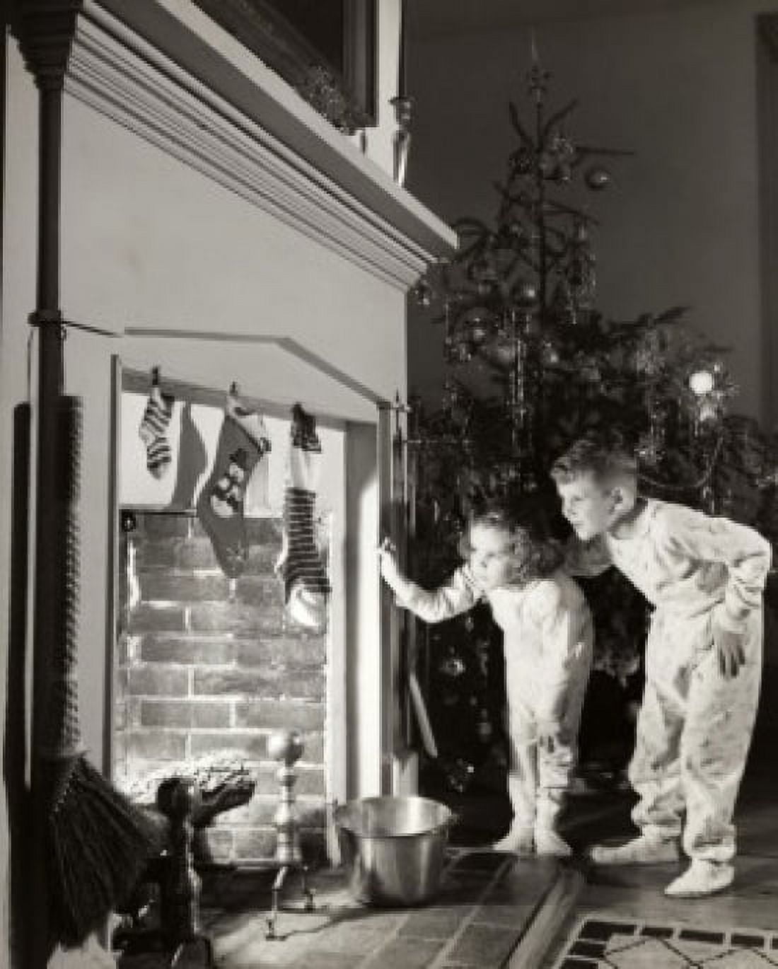 Posterazzi Boy and his sister peeking into a fireplace Canvas Art -  (24 x 36)