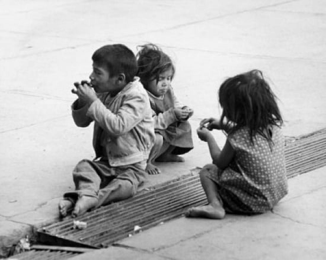 Posterazzi Boy and two girls sitting on a road Mexico Canvas Art - (24 x 36)