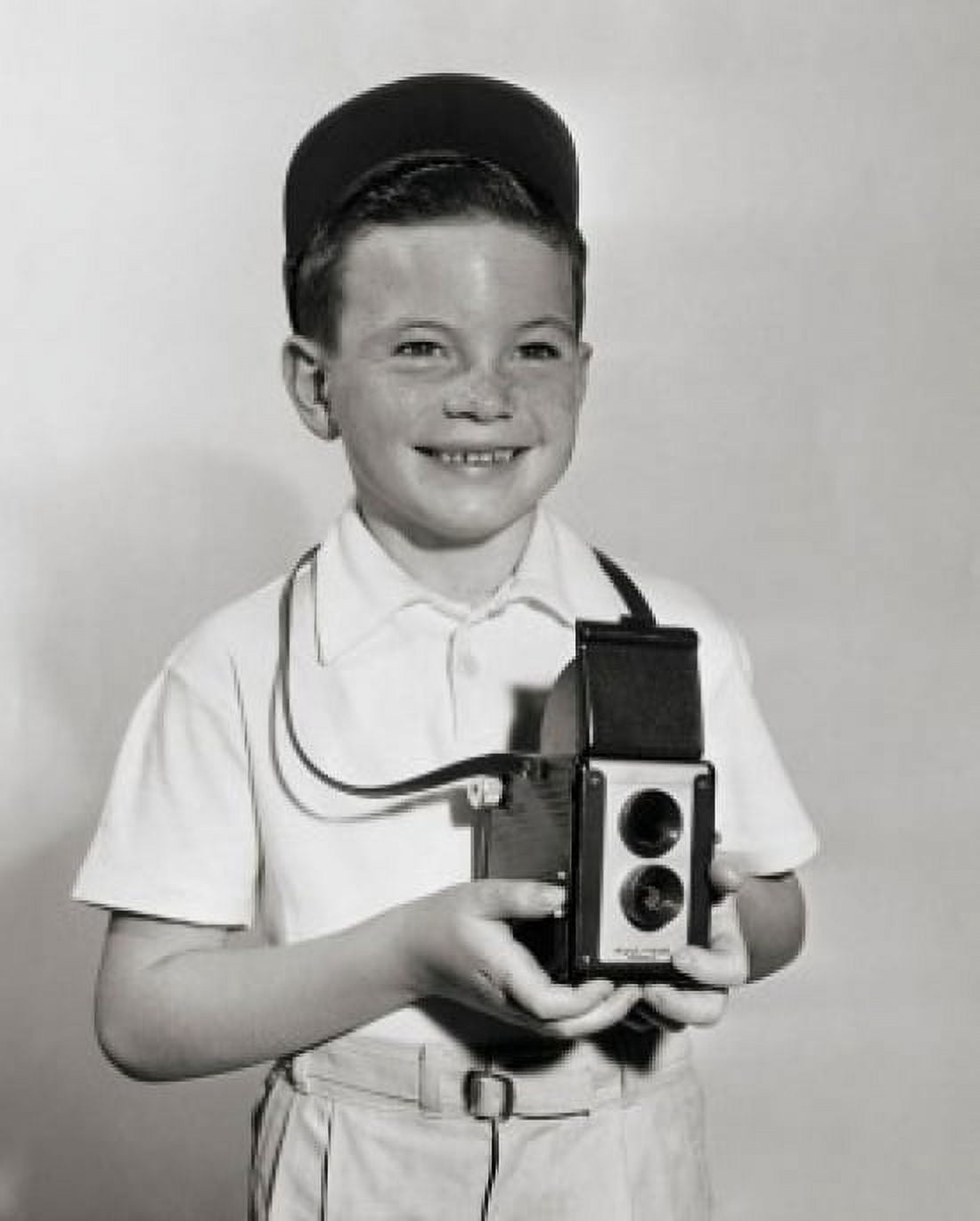 Posterazzi Boy holding camera Canvas Art -  (24 x 36)