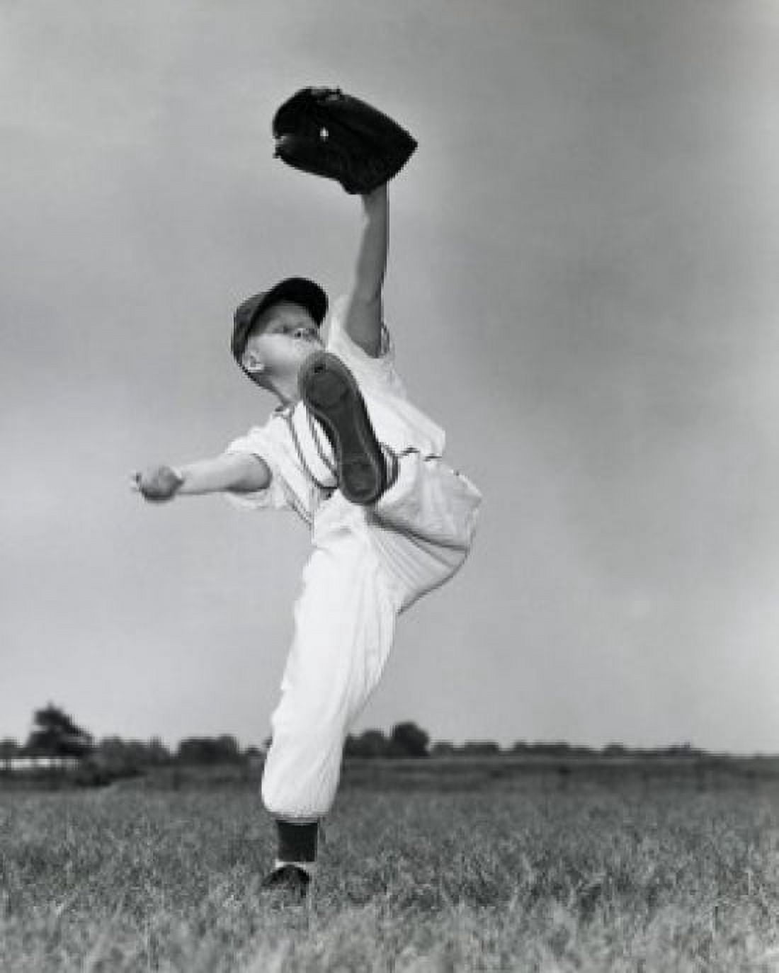 Posterazzi Boy pitching ball Canvas Art -  (24 x 36)