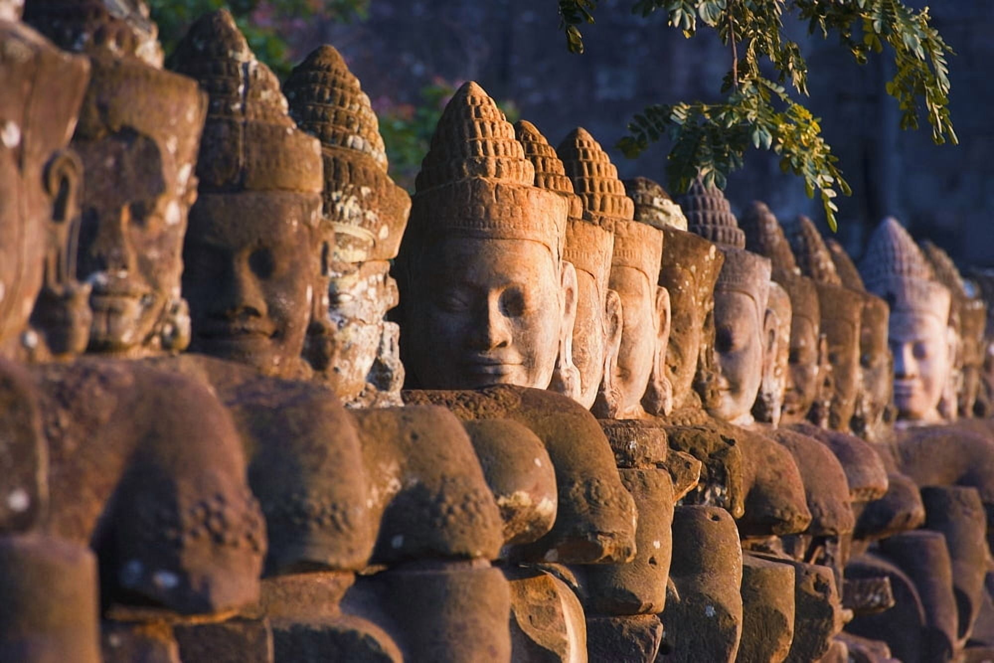 Posterazzi Buddha Head Statues Angkor Wat Temple Complex Canvas Art - Carson Ganci Design Pics (34 x 22)
