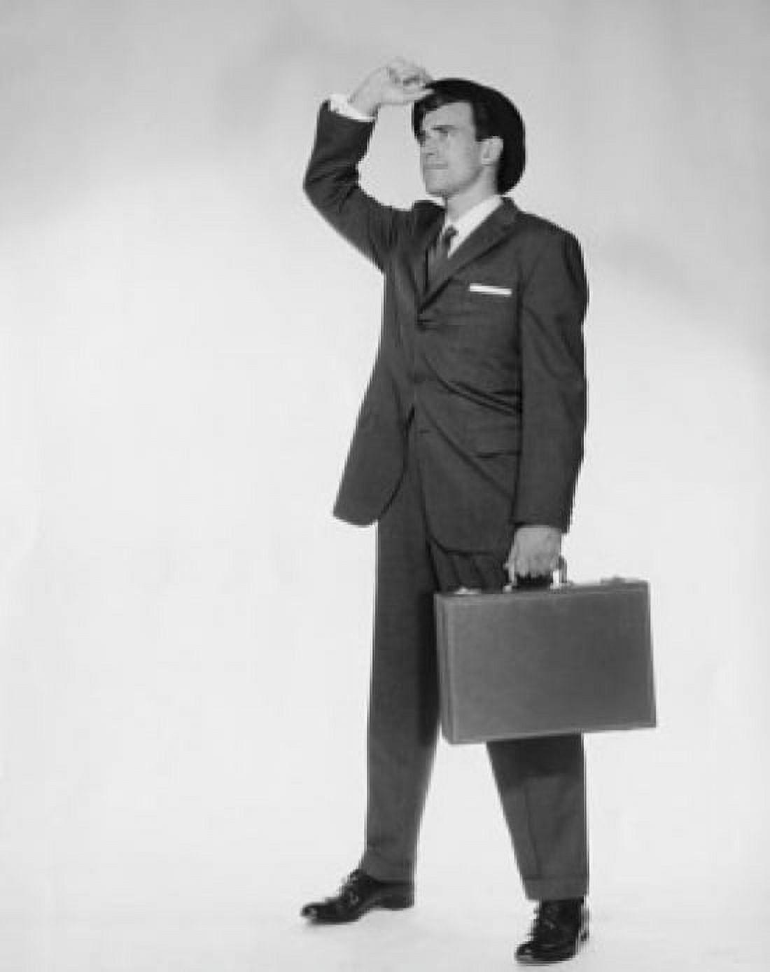 Posterazzi Businessman carrying briefcase Canvas Art - (24 x 36)