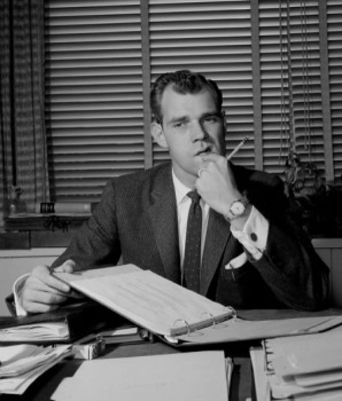 Posterazzi Businessman sitting on desk with paperwork Canvas Art - (24 x 36)