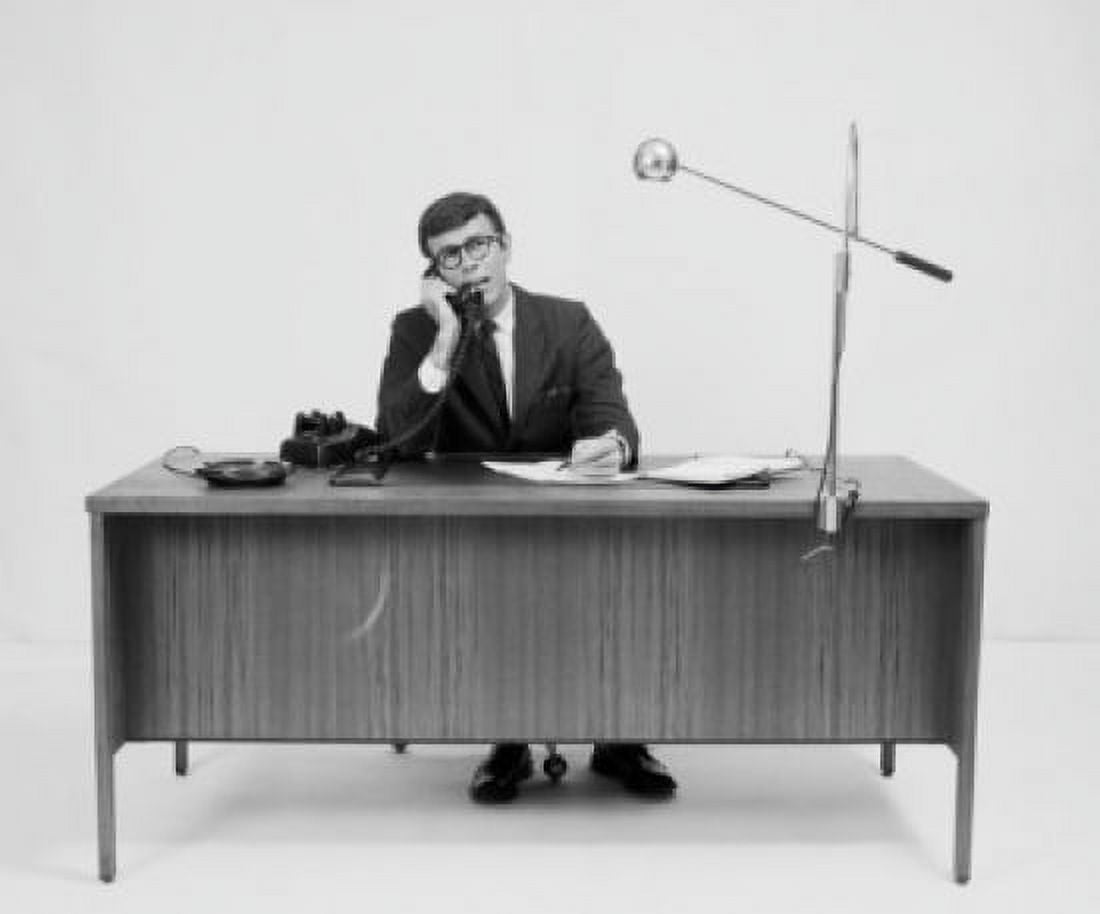 Posterazzi Businessman talking on the telephone in an office Canvas Art - (24 x 36)