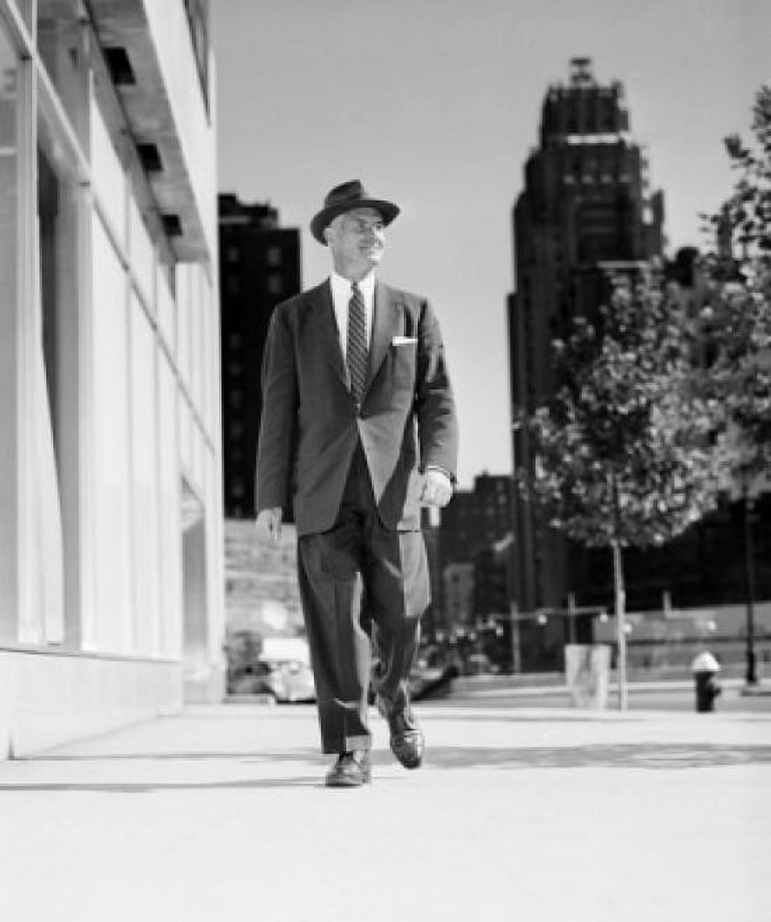 Posterazzi Businessman walking on street Canvas Art -  (24 x 36)