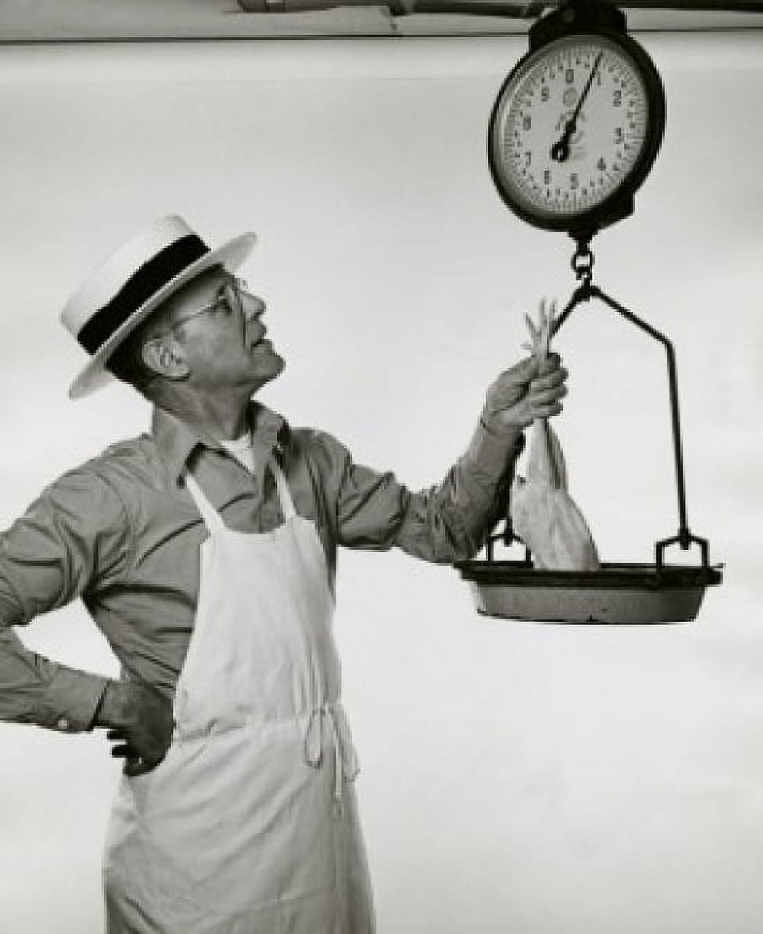 Posterazzi Butcher weighing a chicken Canvas Art - (24 x 36)