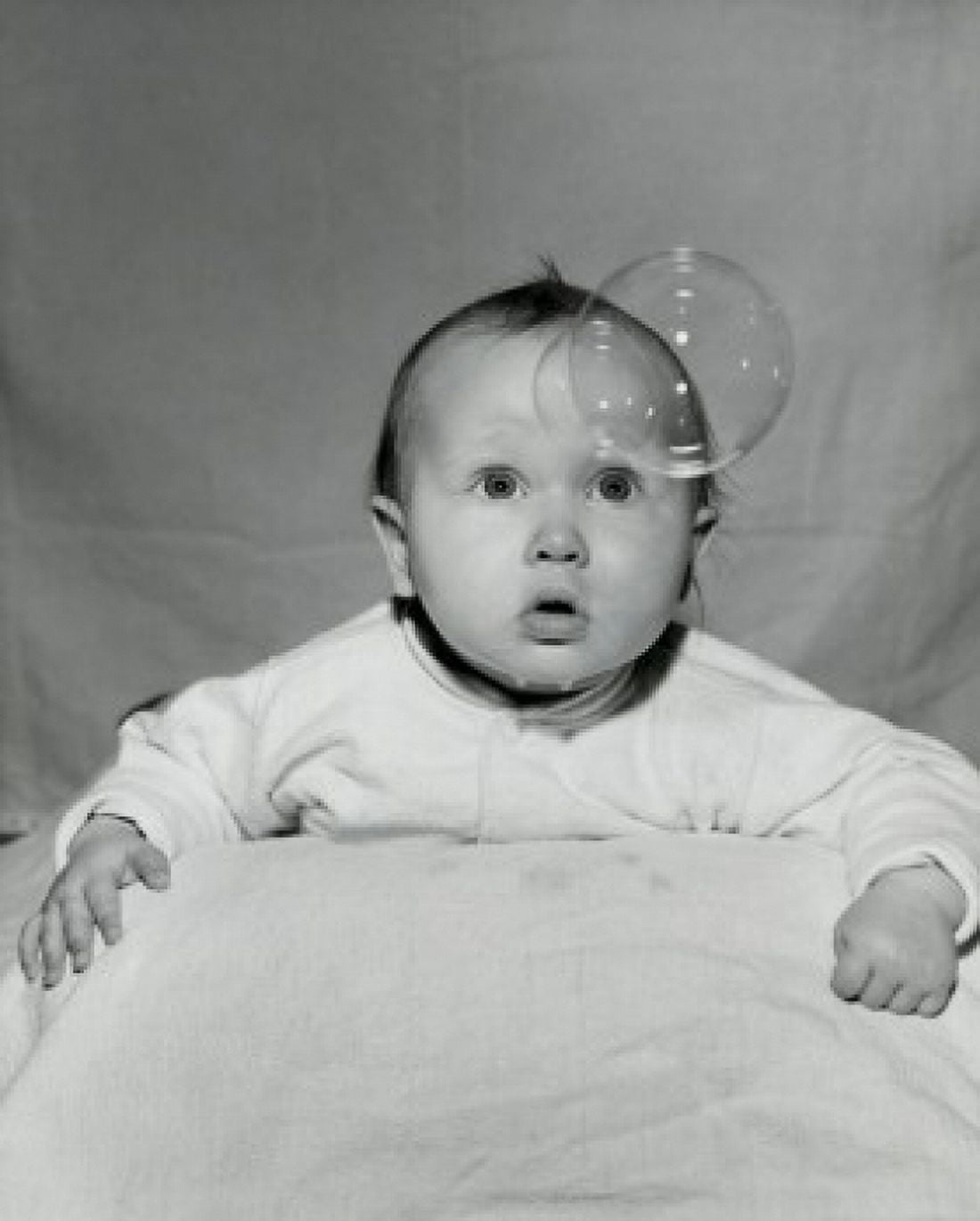 Posterazzi Close-up of a baby boy looking at a bubble Canvas Art - (24 x 36)