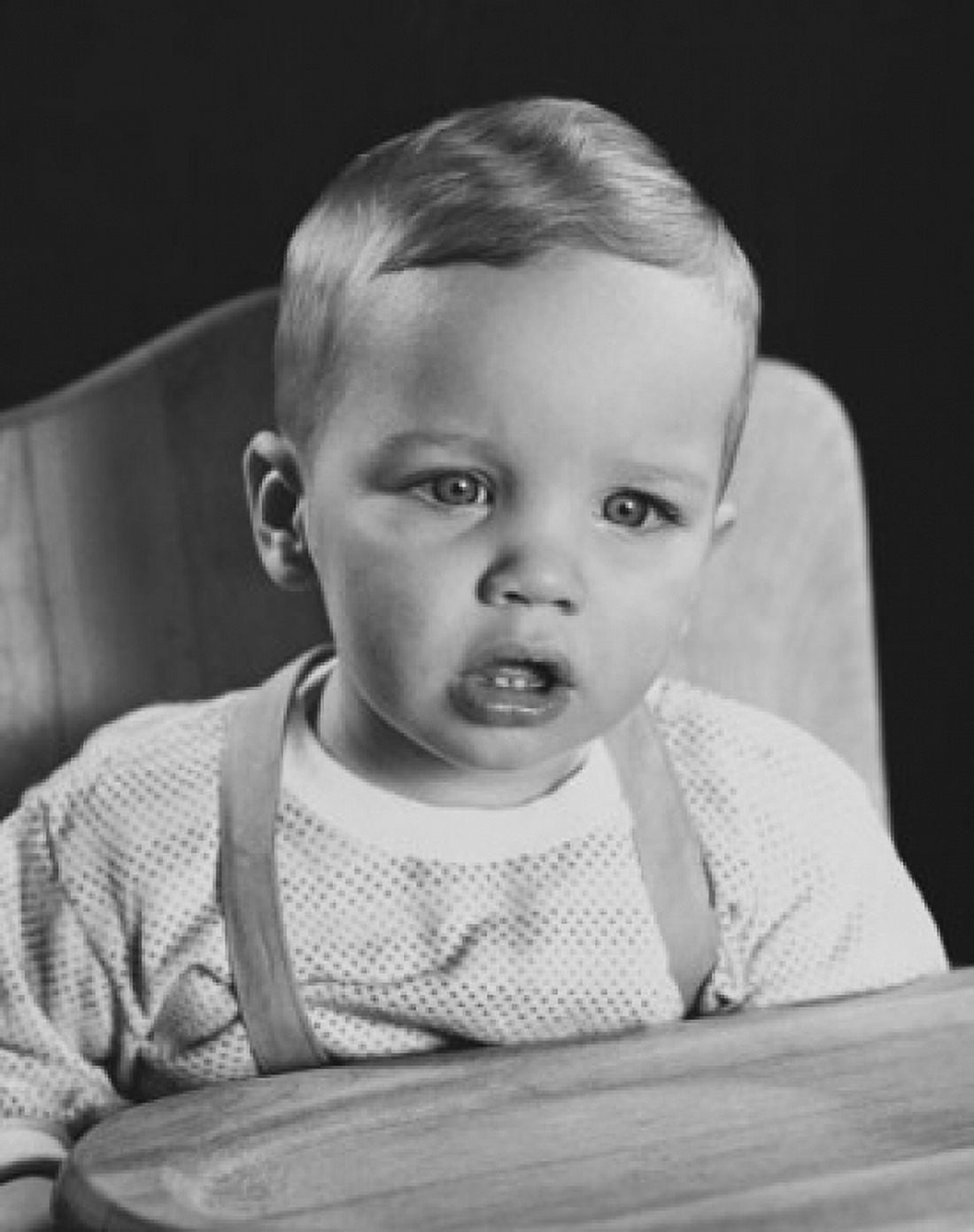 Posterazzi Close-up of a baby sitting in a high chair Canvas Art -  (24 x 36)