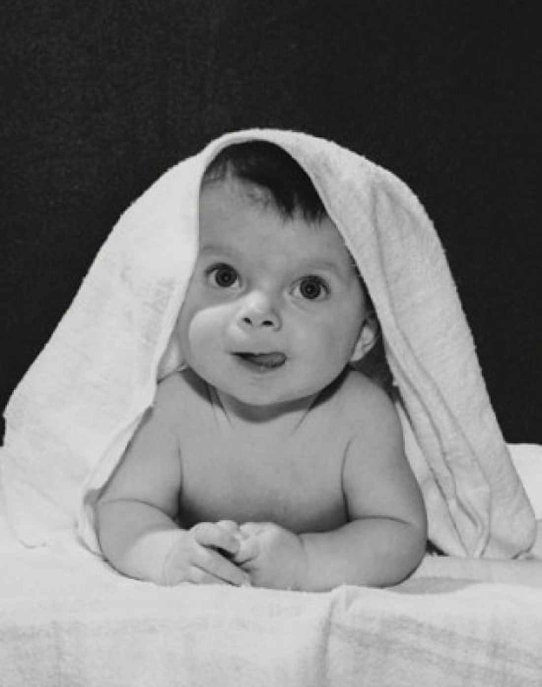 Posterazzi Close-up of a baby sticking its tongue out Canvas Art - (24 x 36)