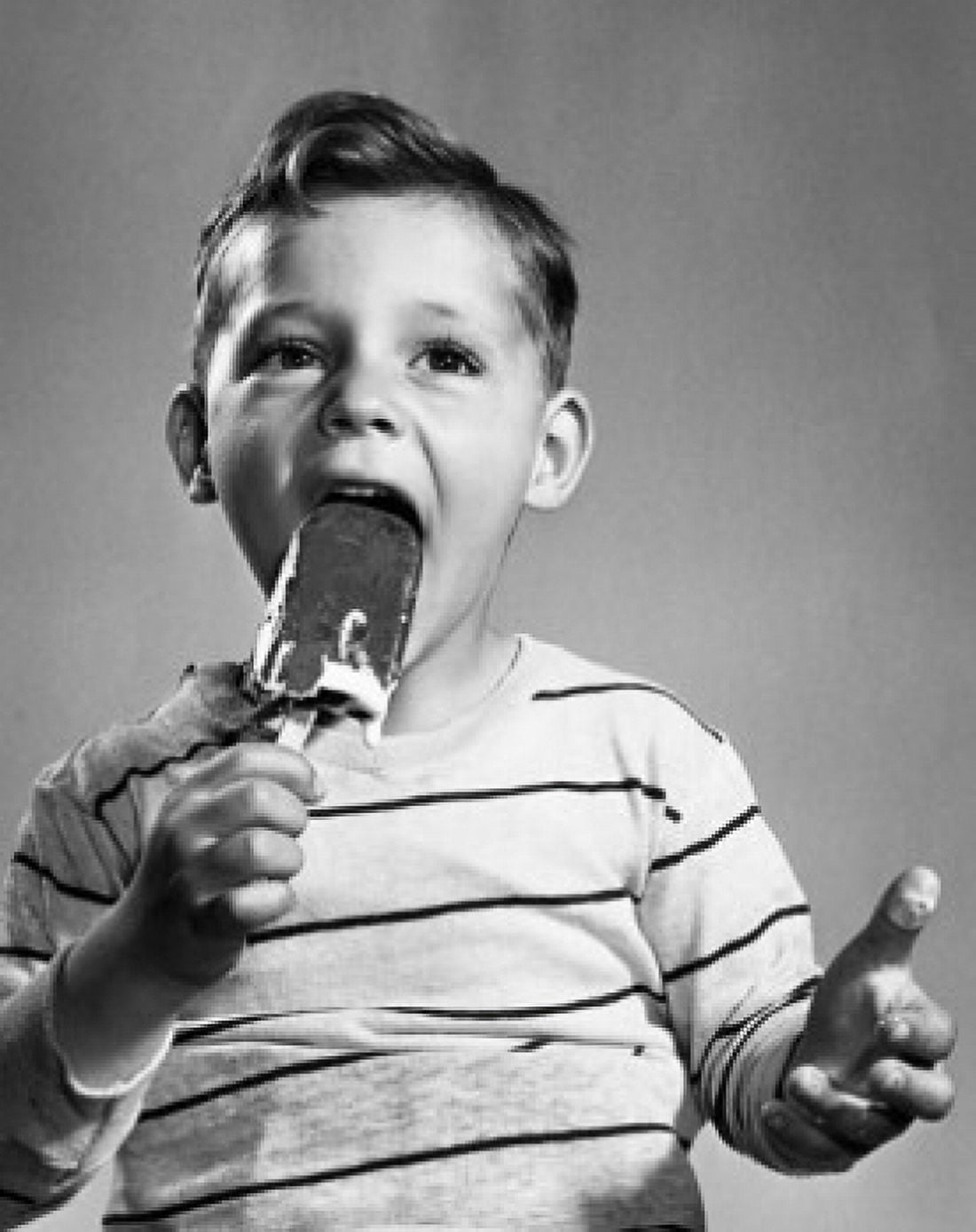Posterazzi Close-up of a boy eating an ice cream Canvas Art - (24 x 36)