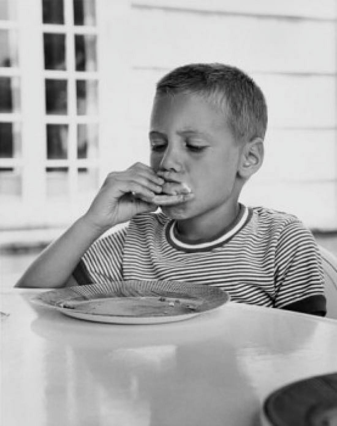 Posterazzi Close-up of a boy having breakfast Canvas Art - (24 x 36)