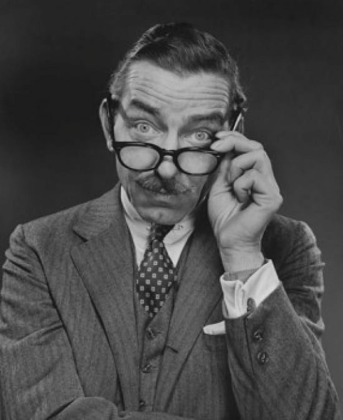 Posterazzi Close-up of a businessman adjusting his eyeglasses Canvas Art - (24 x 36)