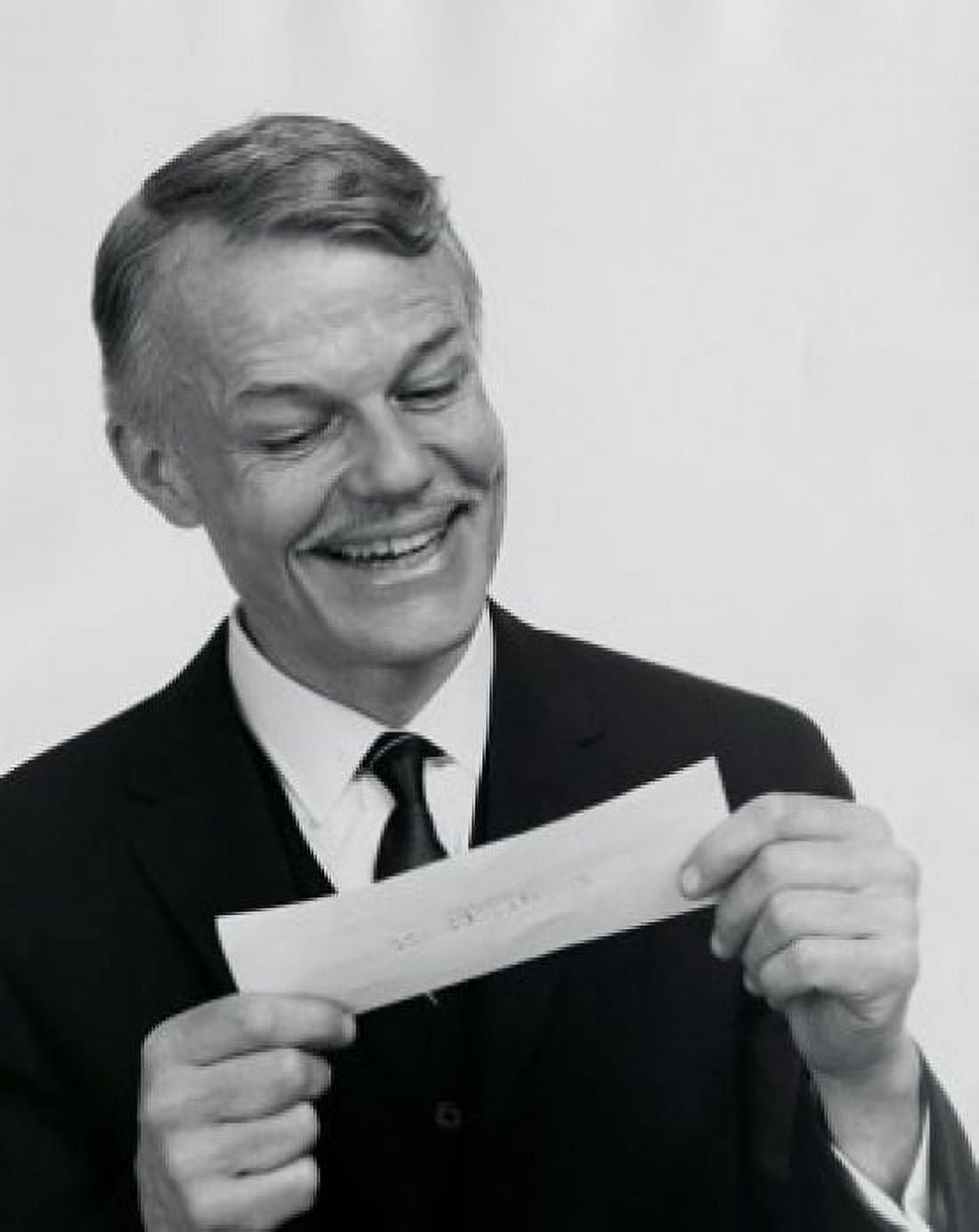 Posterazzi Close-up of a businessman looking at a check Canvas Art - (24 x 36)