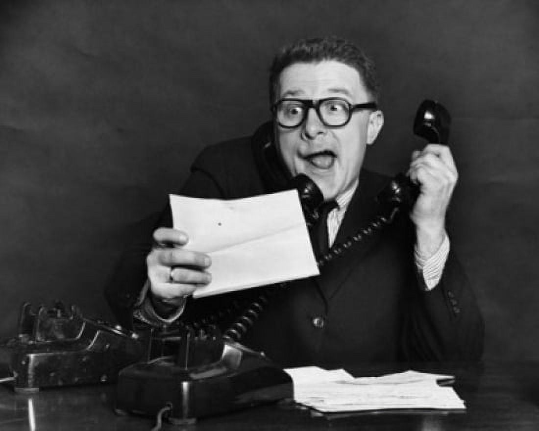 Posterazzi Close-up of a businessman using two telephones Canvas Art - (24 x 36)