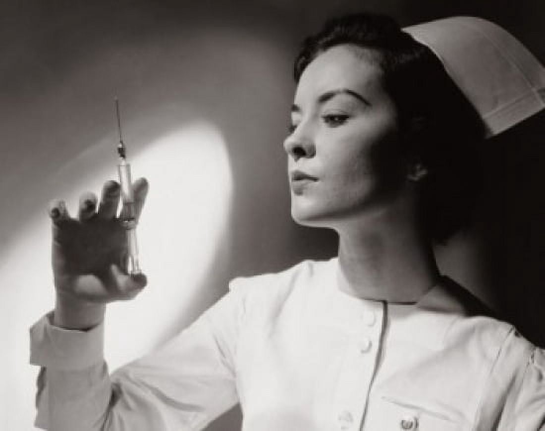 Posterazzi Close-up of a female nurse holding a syringe Canvas Art - (24 x 36)
