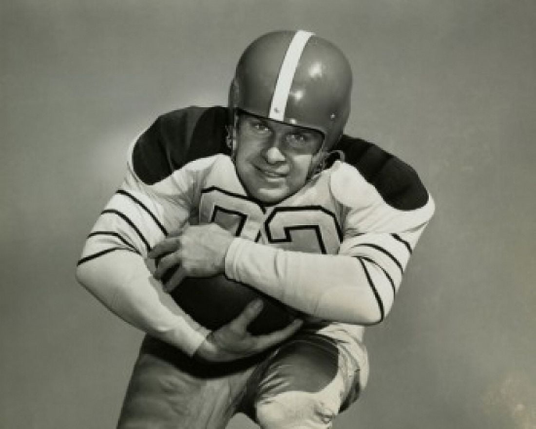 Posterazzi Close-up of a football player running with a football Canvas Art - (24 x 36)