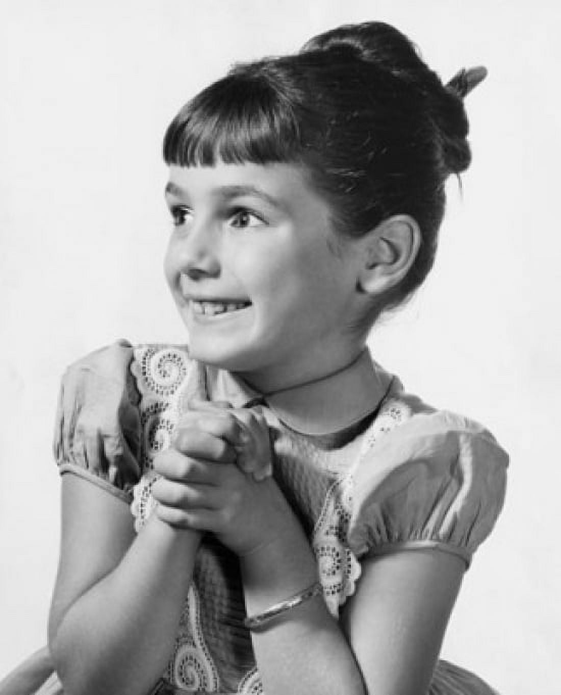 Posterazzi Close-up of a girl smiling with her hands clasped Canvas Art -  (24 x 36)