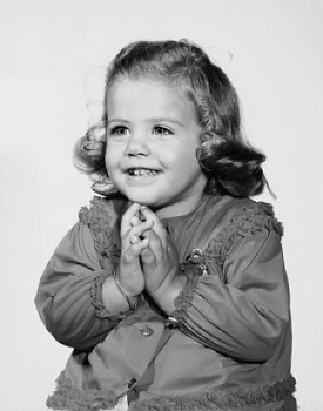 Posterazzi Close-up of a girl smiling with her hands folded Canvas Art -  (24 x 36)