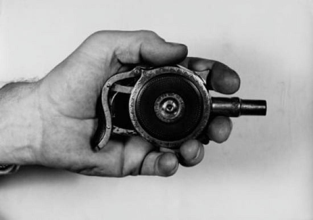Posterazzi Close-up of a mans hand holding a squeezer pistol Canvas Art - (24 x 36)