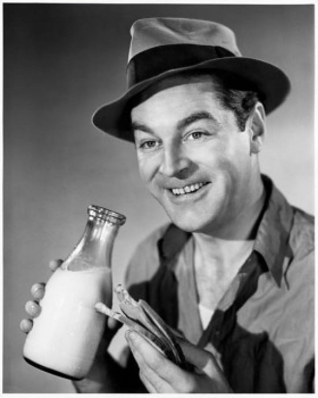 Posterazzi Close-up of a mid adult man drinking milk eating a sandwich Canvas Art - (24 x 36)