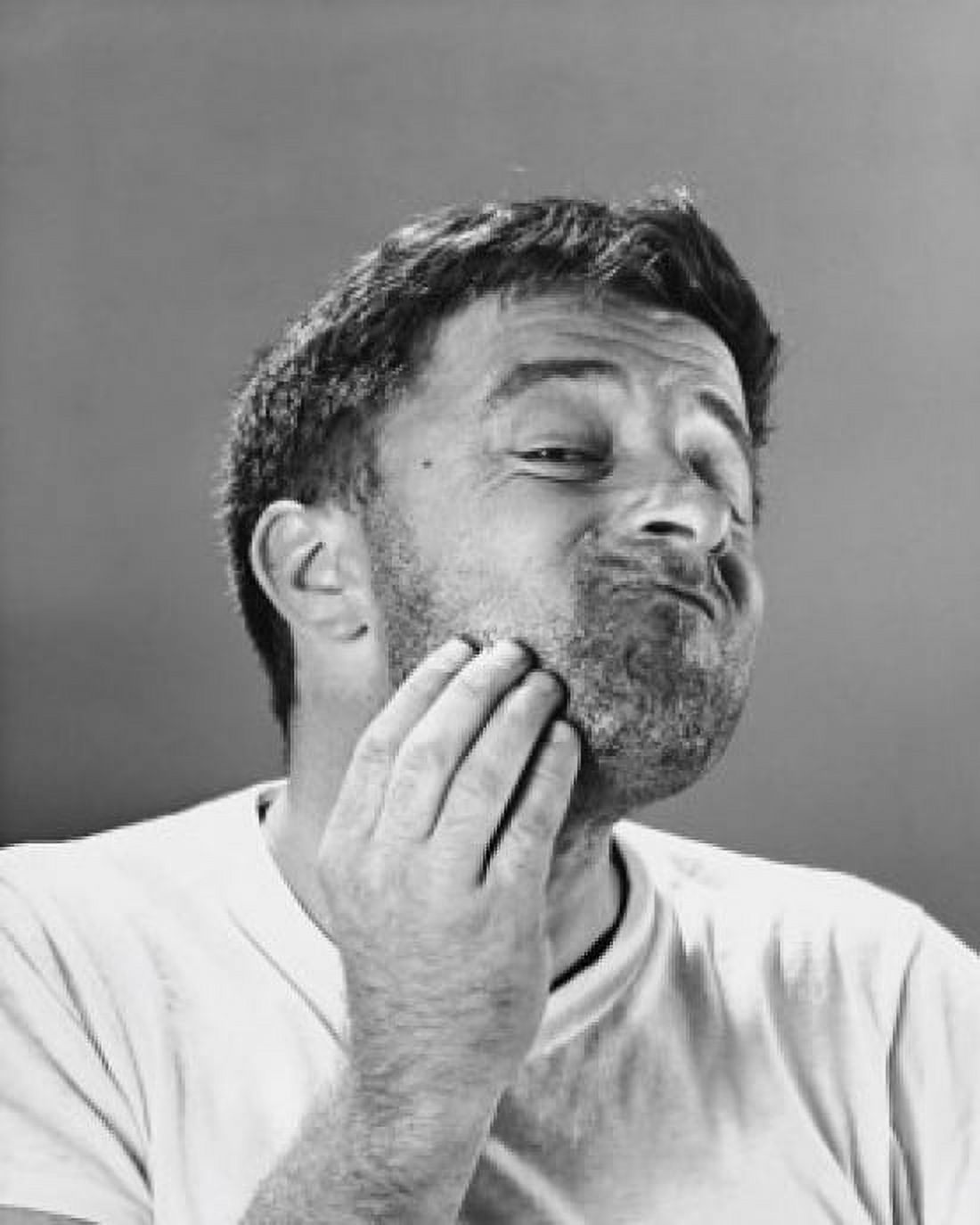 Posterazzi Close-up of a mid adult man scratching Canvas Art - (24 x 36)