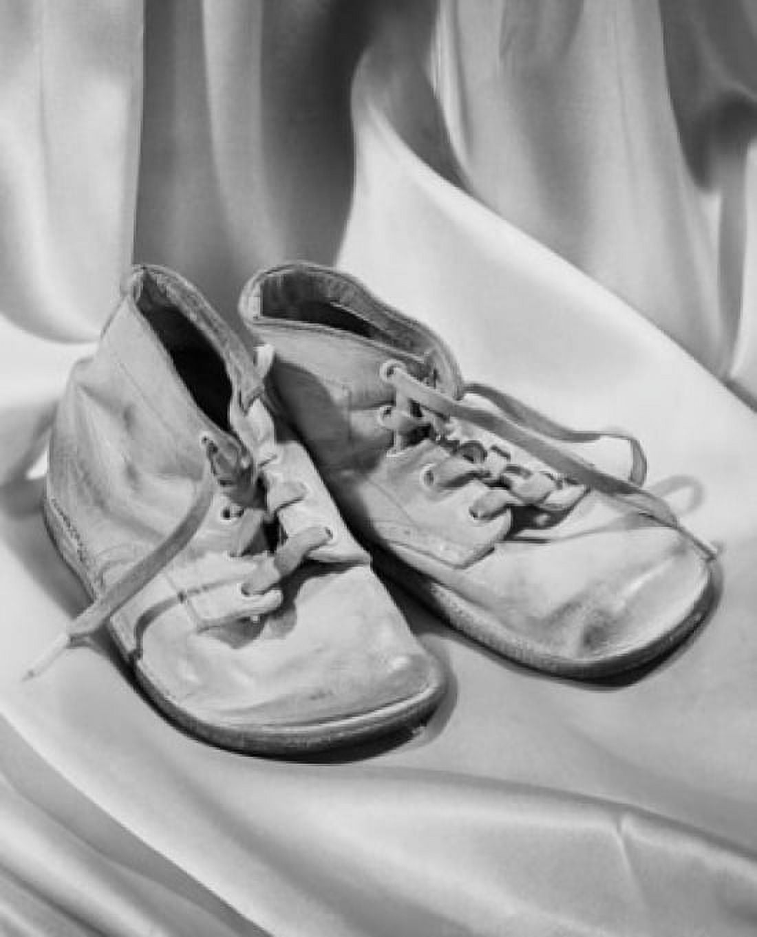 Posterazzi Close-up of a pair of baby booties Canvas Art - (24 x 36)