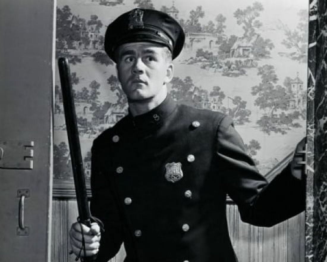 Posterazzi Close-up of a policeman holding a stick Canvas Art - (24 x 36)