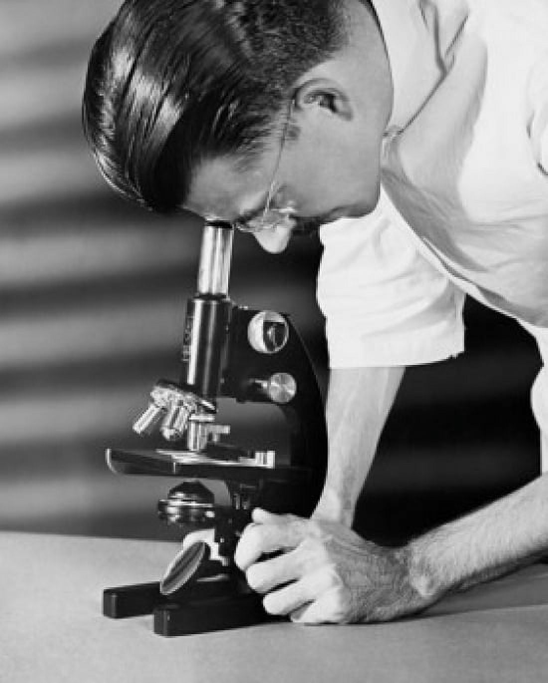 Posterazzi Close-up of a scientist looking through a microscope Canvas Art - (24 x 36)