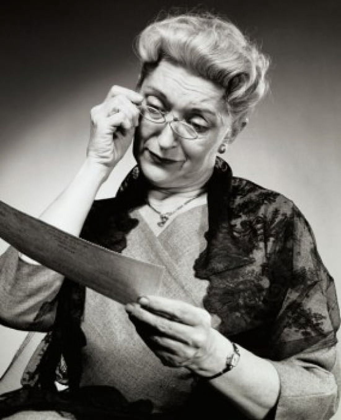 Posterazzi Close-up of a senior woman reading a letter Canvas Art - (24 x 36)