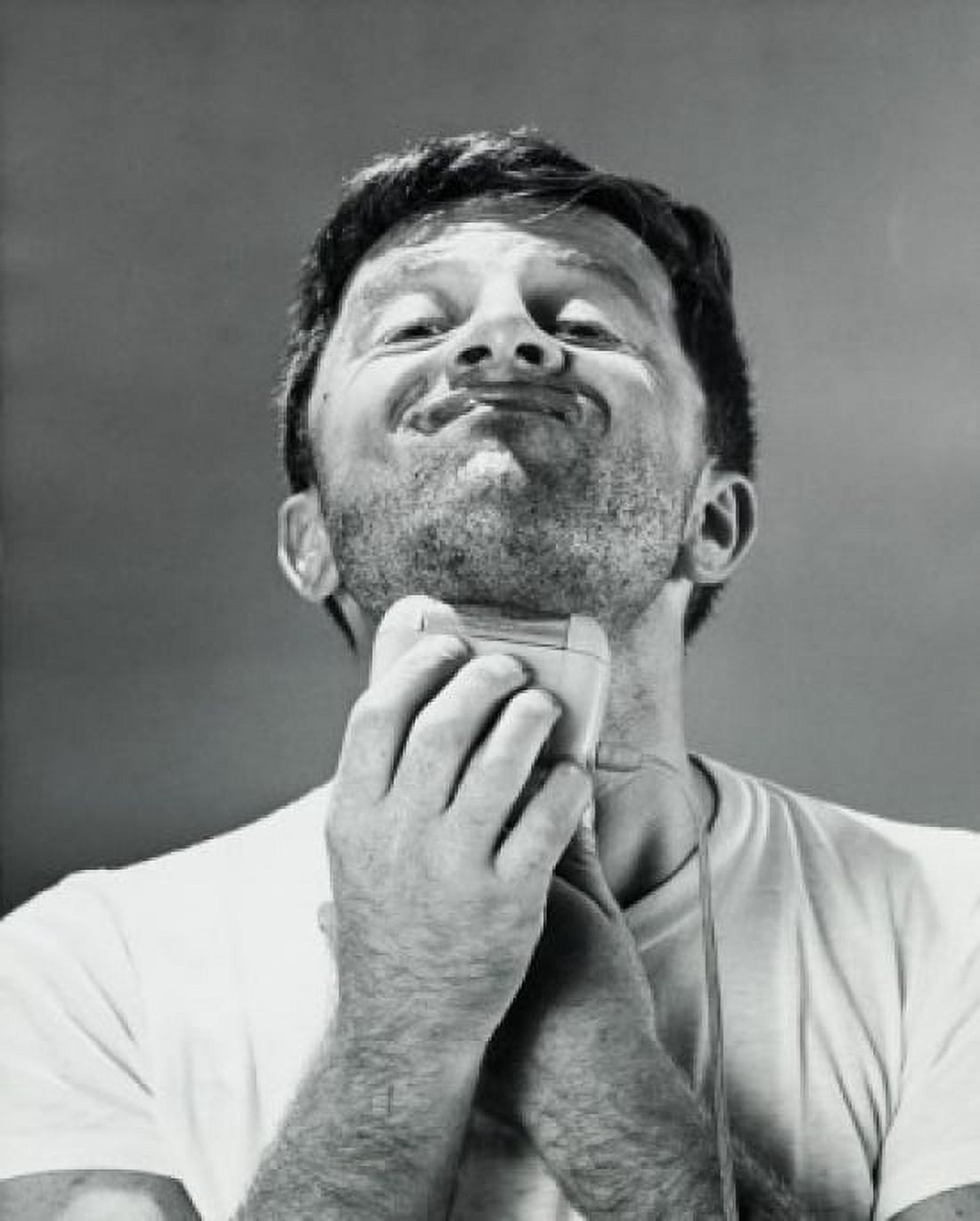 Posterazzi Close-up of a young man shaving Canvas Art -  (24 x 36)