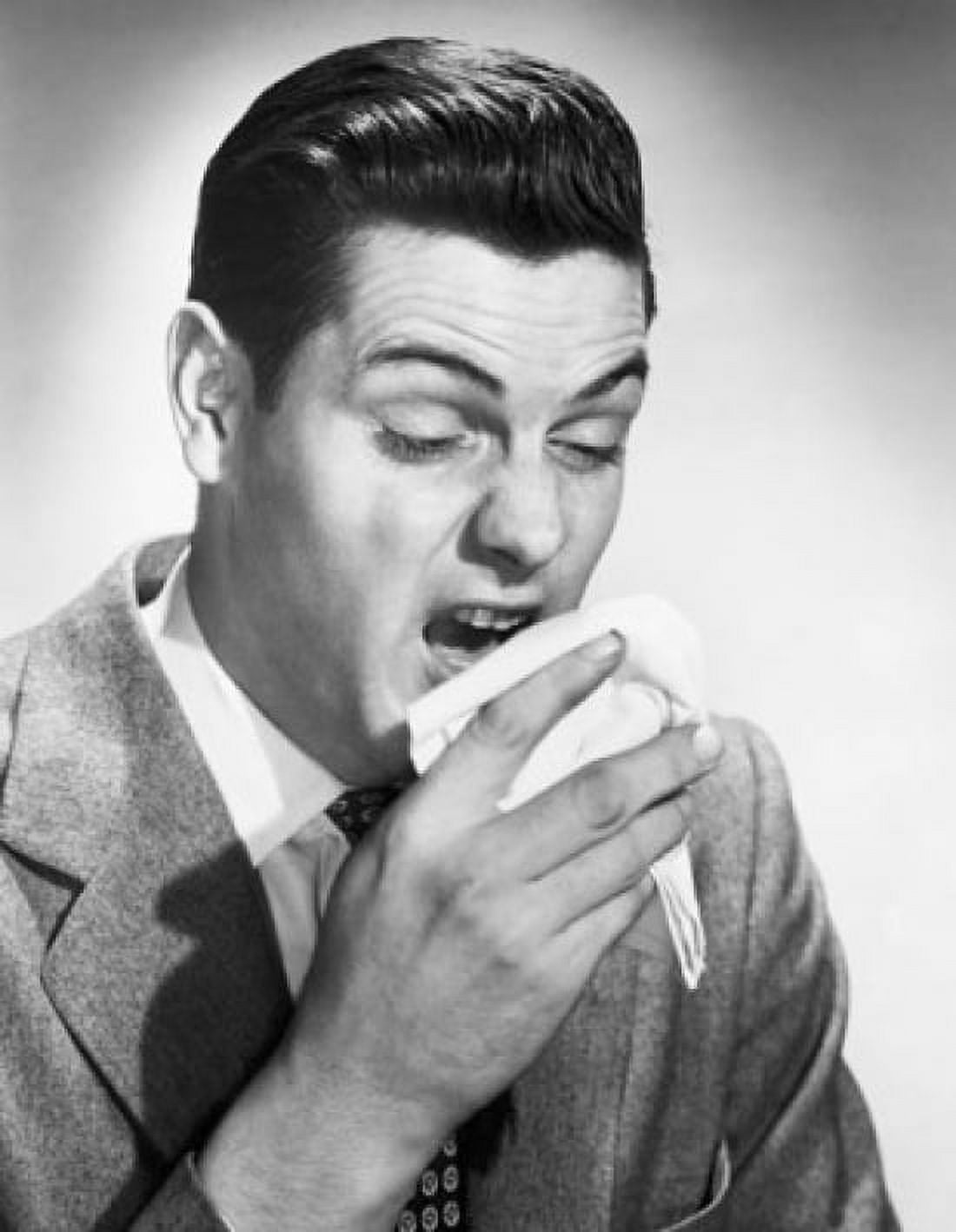 Posterazzi Close-up of a young man sneezing Canvas Art - (24 x 36)