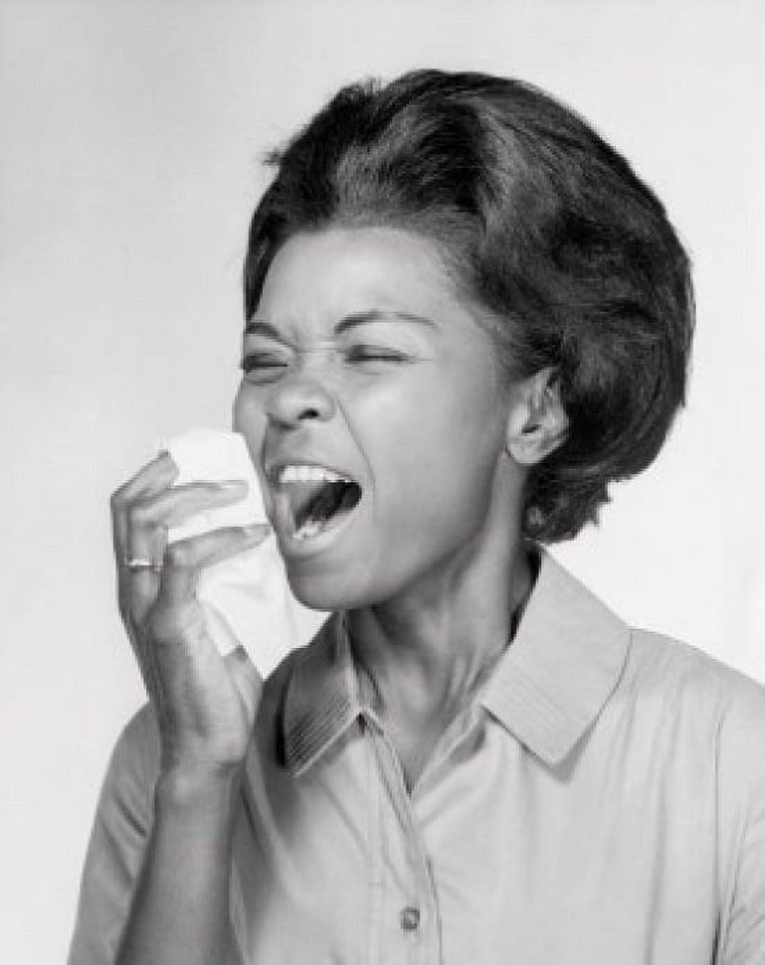 Posterazzi Close-up of a young woman sneezing Canvas Art - (24 x 36)