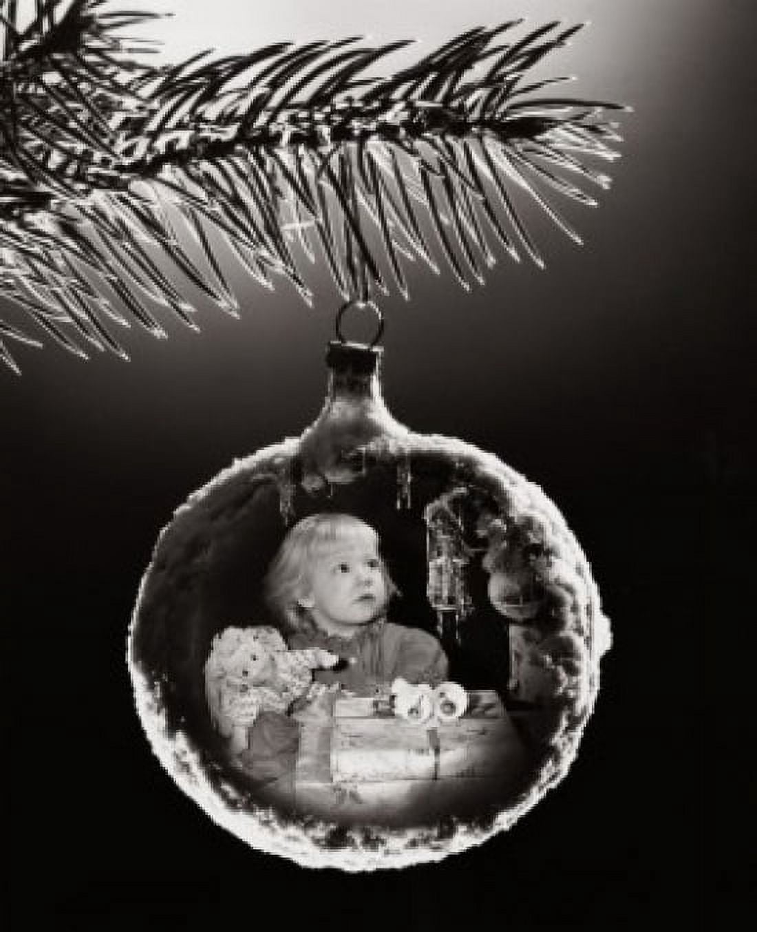 Posterazzi Close-up of an image of a girl with Christmas presents superimposed on a Christmas ornament Canvas Art - (24 x 36)
