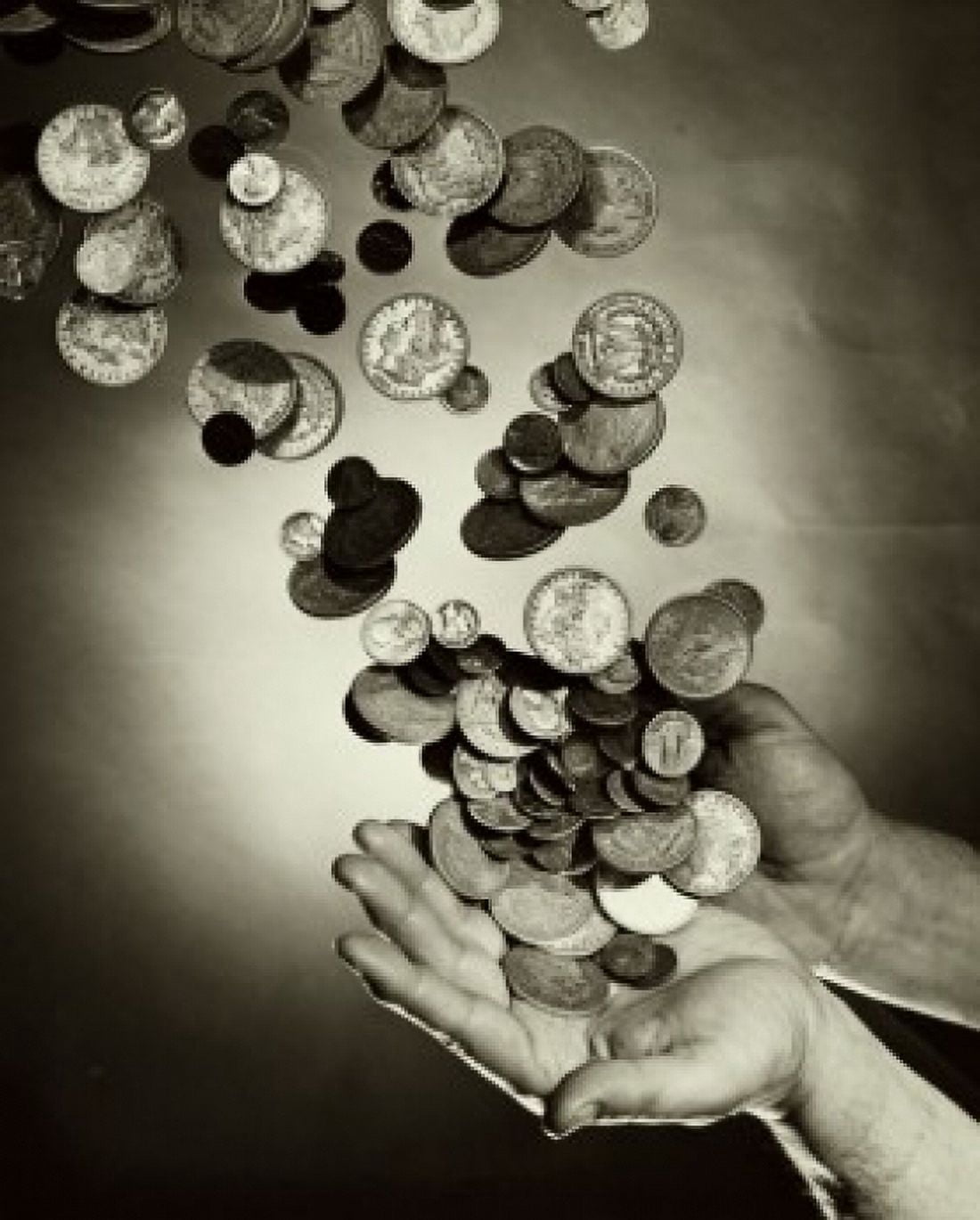 Posterazzi Close-up of coins falling on a persons hands Canvas Art -  (24 x 36)