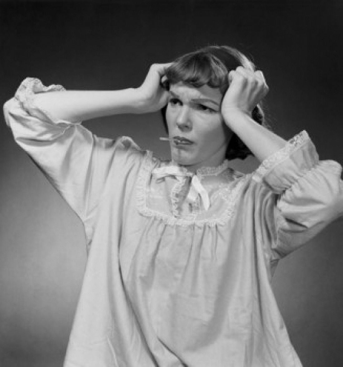 Posterazzi Close-up of mid adult woman suffering from a headache Canvas Art - (24 x 36)