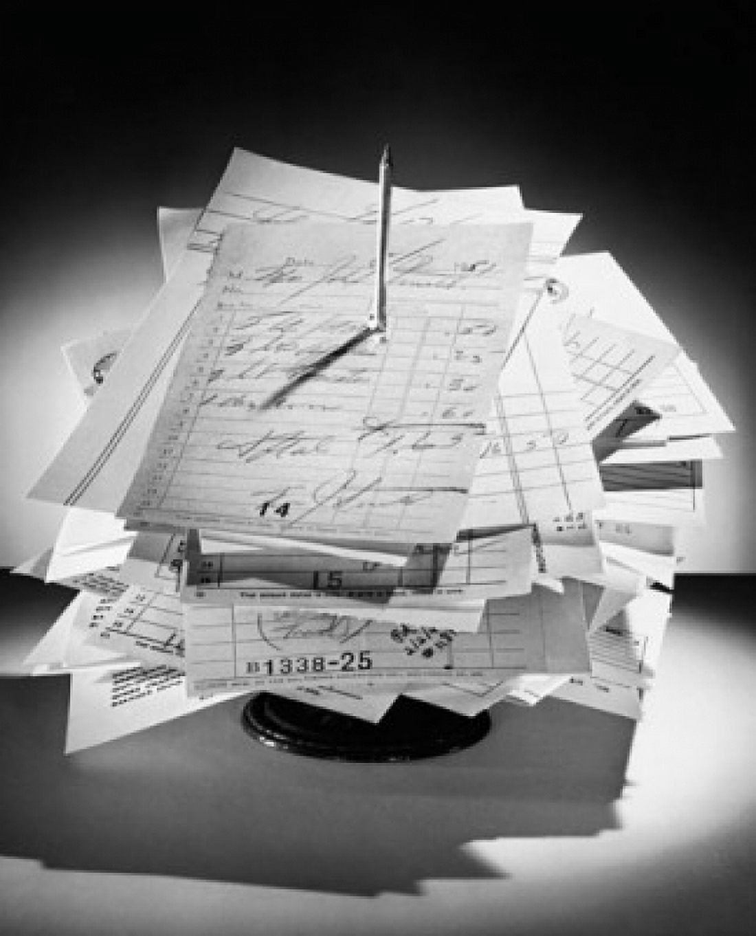 Posterazzi Close-up of receipts on a spike Canvas Art -  (24 x 36)
