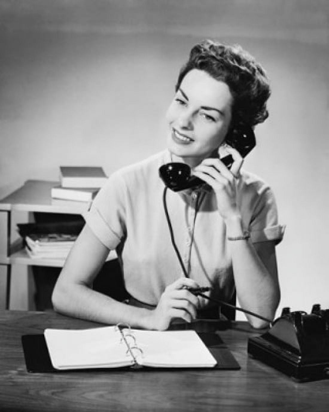 Posterazzi Close-up view of businesswoman talking on telephone Canvas Art -  (24 x 36)