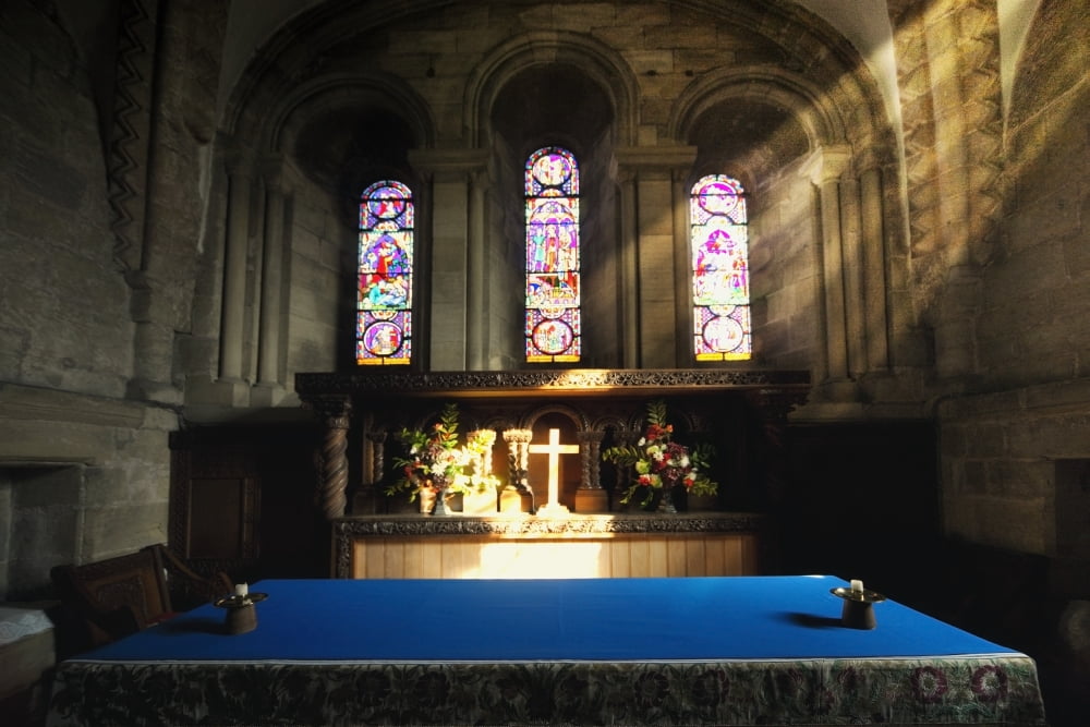 Posterazzi Cross Illuminated At The Altar Of A Church Canvas Art - John Short Design Pics (38 x 24)