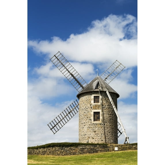 Posterazzi DPI12282593LARGE An Old Stone Windmill on A Hillside with Wooden Blades Surrounded Poster Print by A Stone Fence with Blue Sky & Clouds - Brehec 2 - 24 x 38 in. - Large