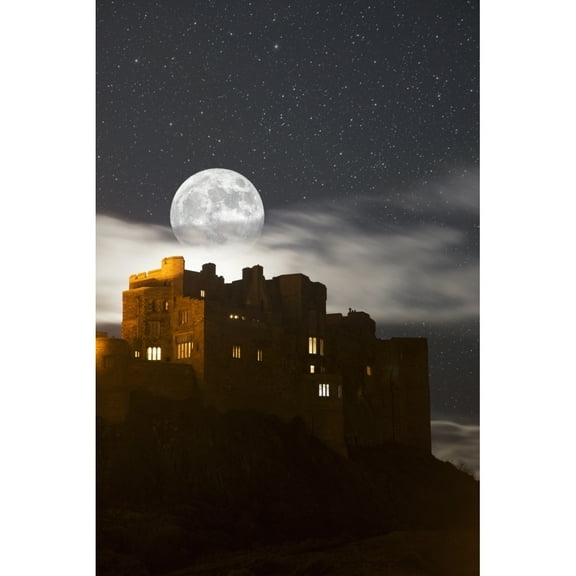 Posterazzi DPI12290122 Full Moon Glowing in a Starry Sky Over Illuminated Buildings - Bamburgh Northumberland England Poster Print by John Short, 12 x 19