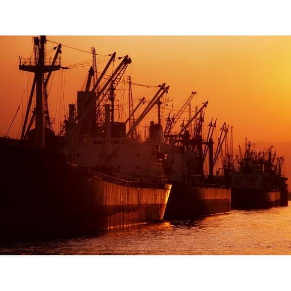 Posterazzi DPI1814634 Shipping Freighters At Sunset Poster Print by The Irish Image Collection, 17 x 13