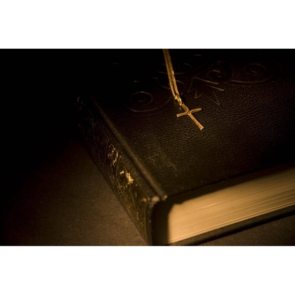 Posterazzi DPI1844703LARGE Gold Cross Pendant Resting On A Book Poster Print, Large - 34 x 22