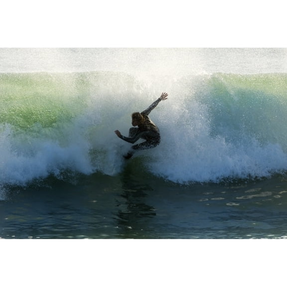 Posterazzi DPI1845489LARGE Surfer Catching A Wave Poster Print, Large - 34 x 22